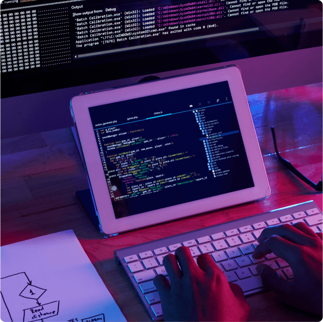 Developer coding on tablet